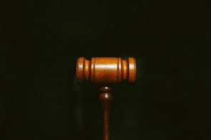 Wooden gavel on dark background