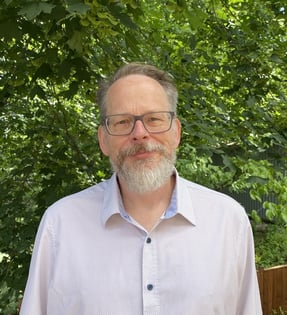 Dr. Tim Oates headshot